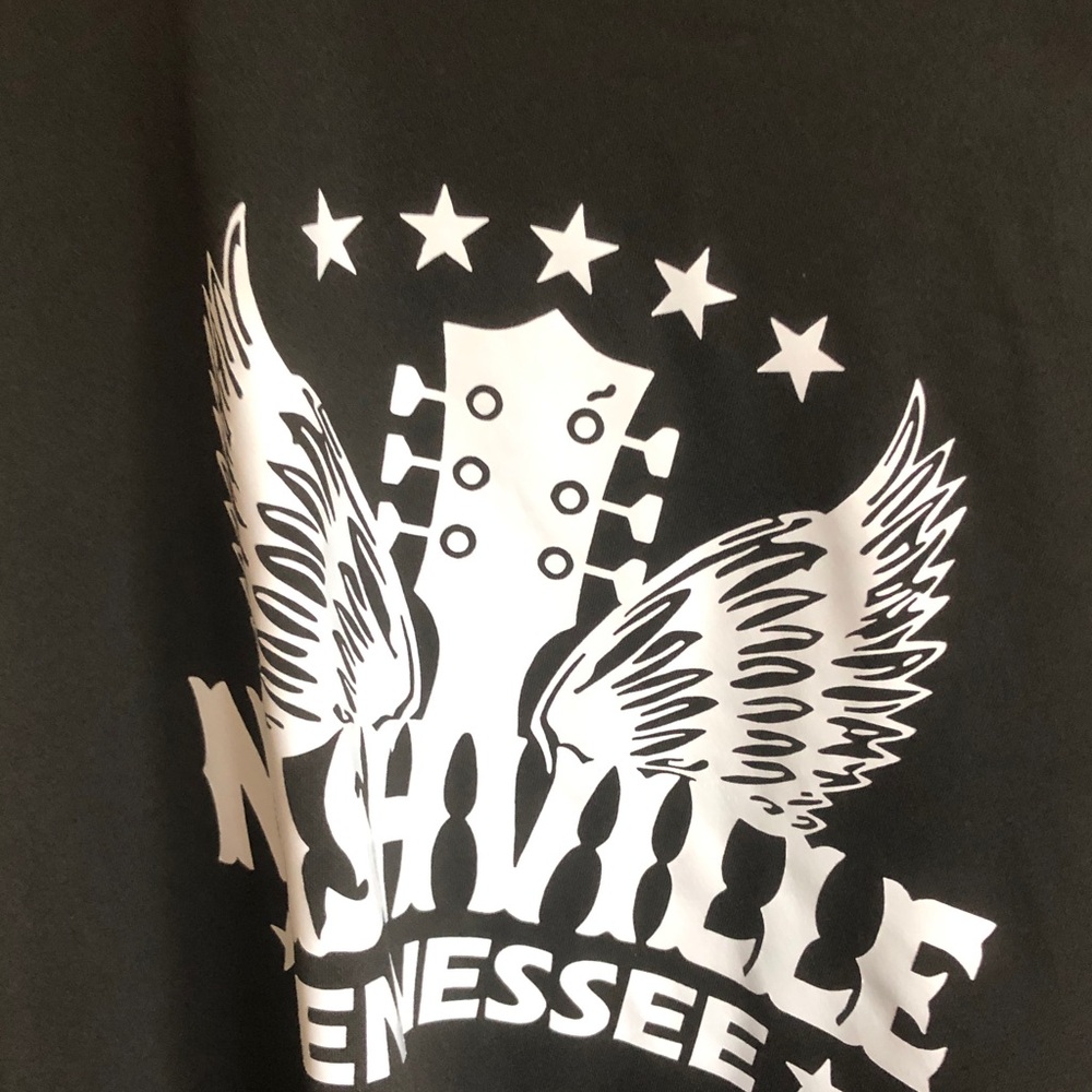 Black Graphic Tee with White Winged Guitar Design